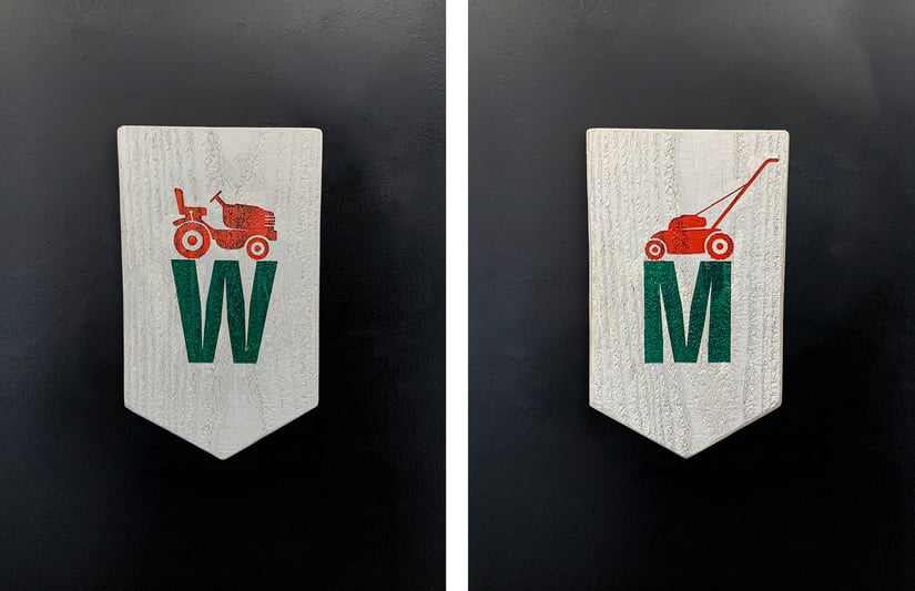 The Yard On Mass Men and Women's Restroom Signs